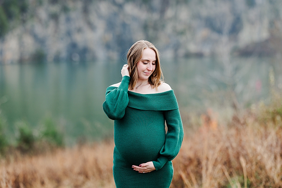 woman holding baby bump at winter maternity