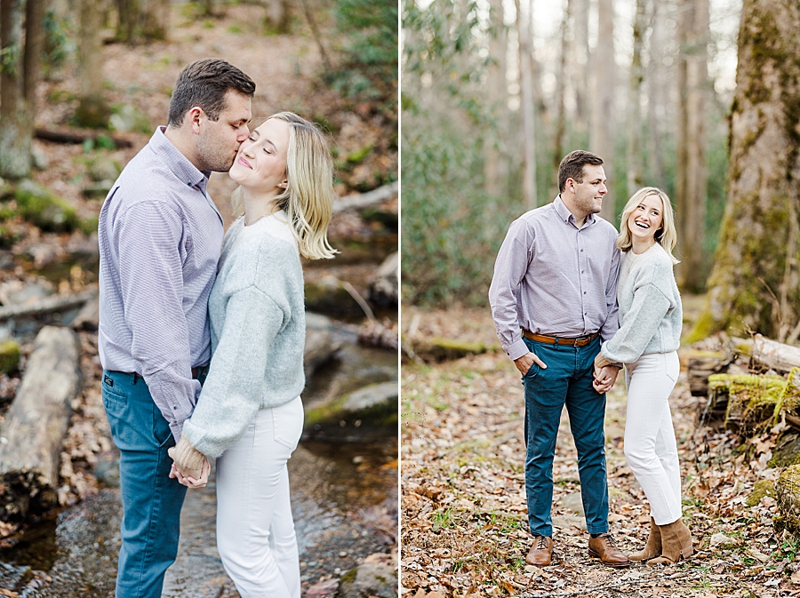 kiss on the cheek at winter mountain engagement
