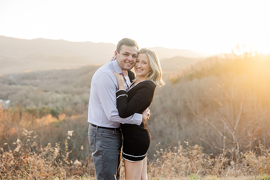 cute couple at winter mountain engagement