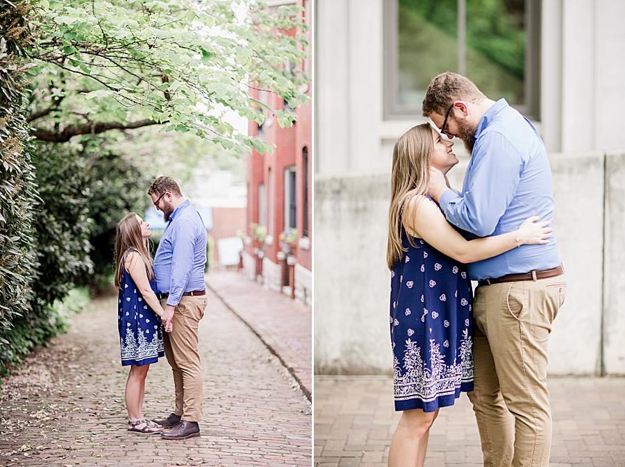 Foreheads together at this downtown engagement by Knoxville Wedding Photographer, Amanda May Photos.