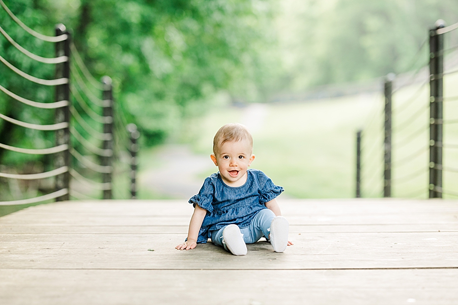 Baby smiling on the bridge at Family Session by Amanda May Photos 