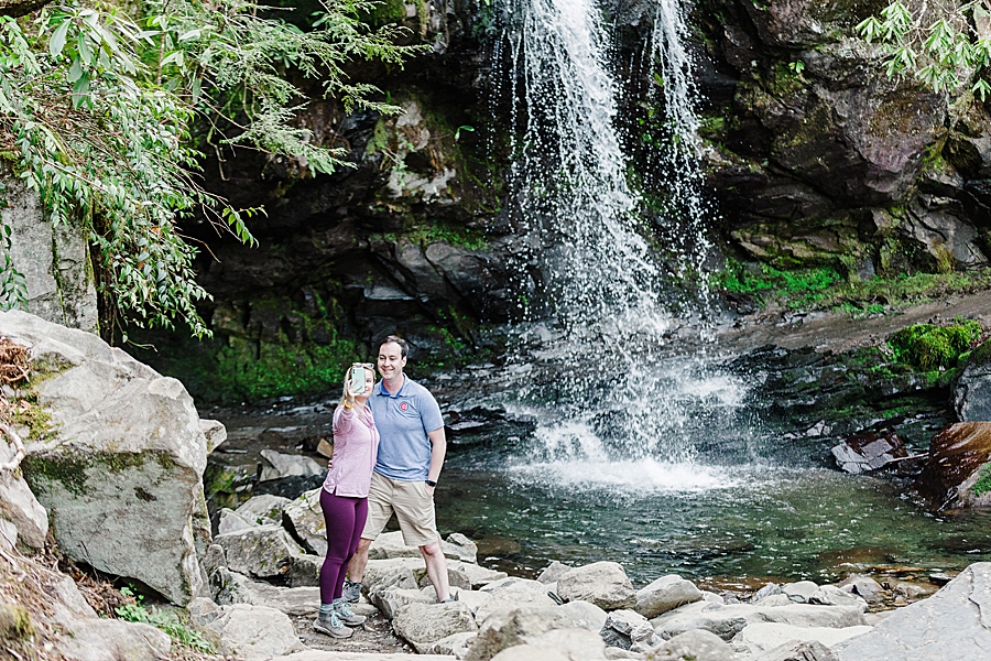 couple taking a selfie at grotto falls proposal
