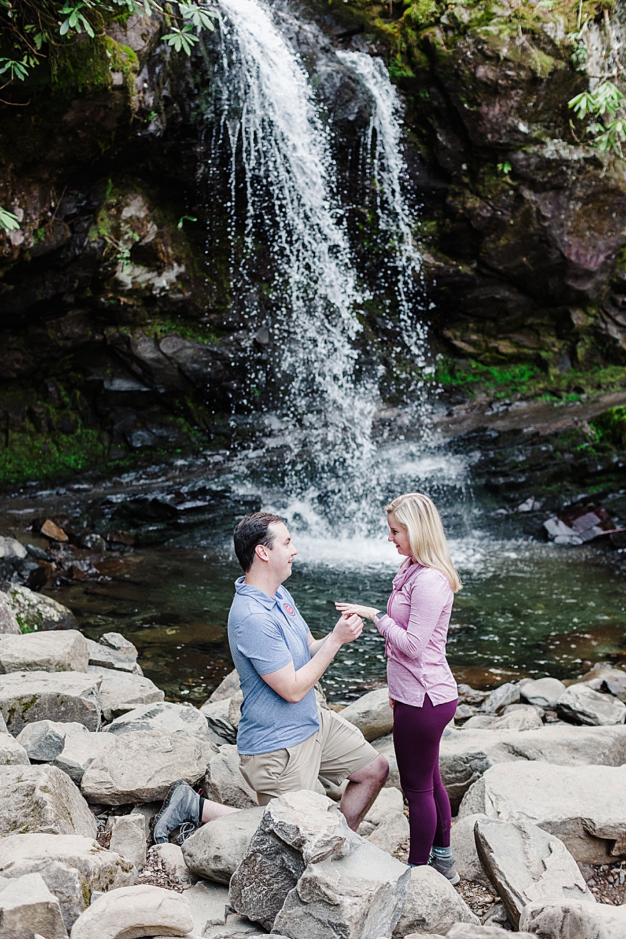 engagement in front of waterfall at grotto falls proposal