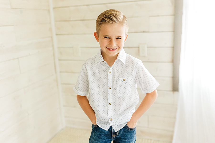 boy in white shirt at hope resource center mini