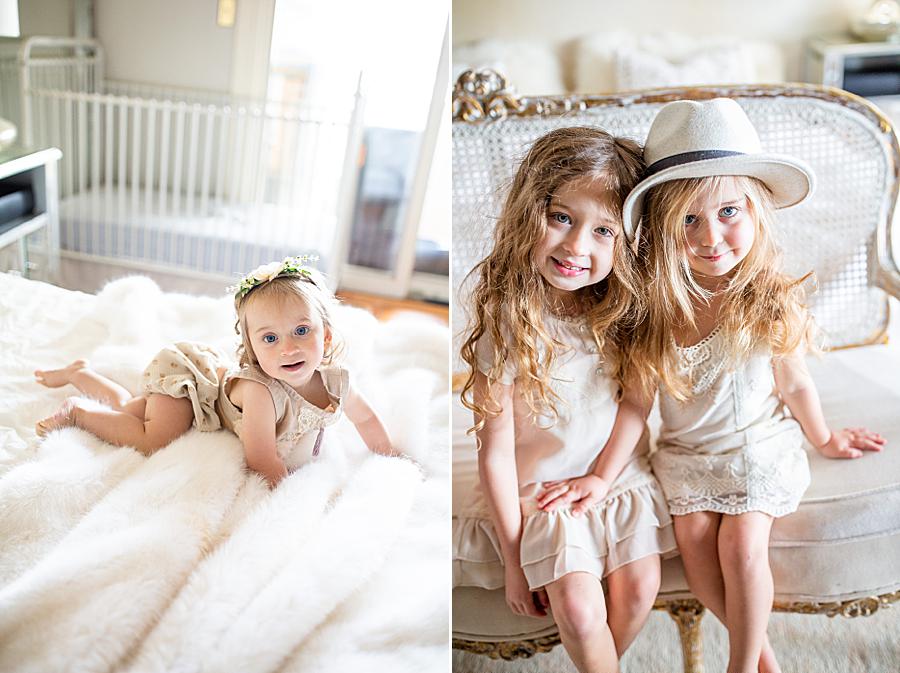 little girls sitting on a couch