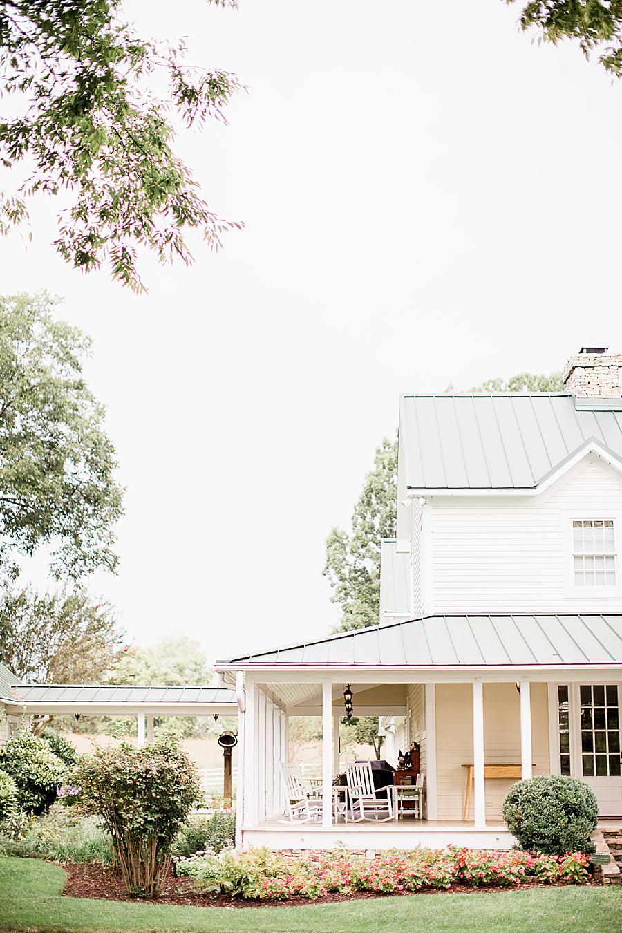 White farmhouse at this Marblegate Farm Wedding by Knoxville Wedding Photographer, Amanda May Photos.