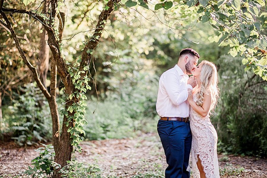 Kissing at this Meads Quarry engagement by Knoxville Wedding Photographer, Amanda May Photos.