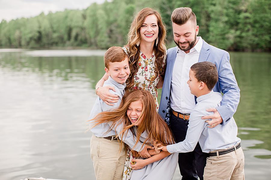 Tickle fight at this Melton Hill Park family session by Knoxville Wedding Photographer, Amanda May Photos.