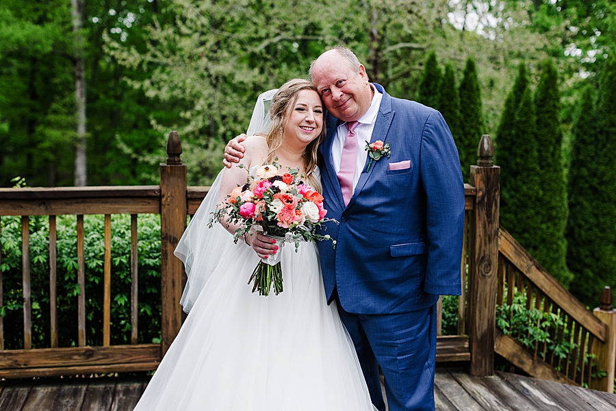 Father and daughter at rainy castleton farms wedding