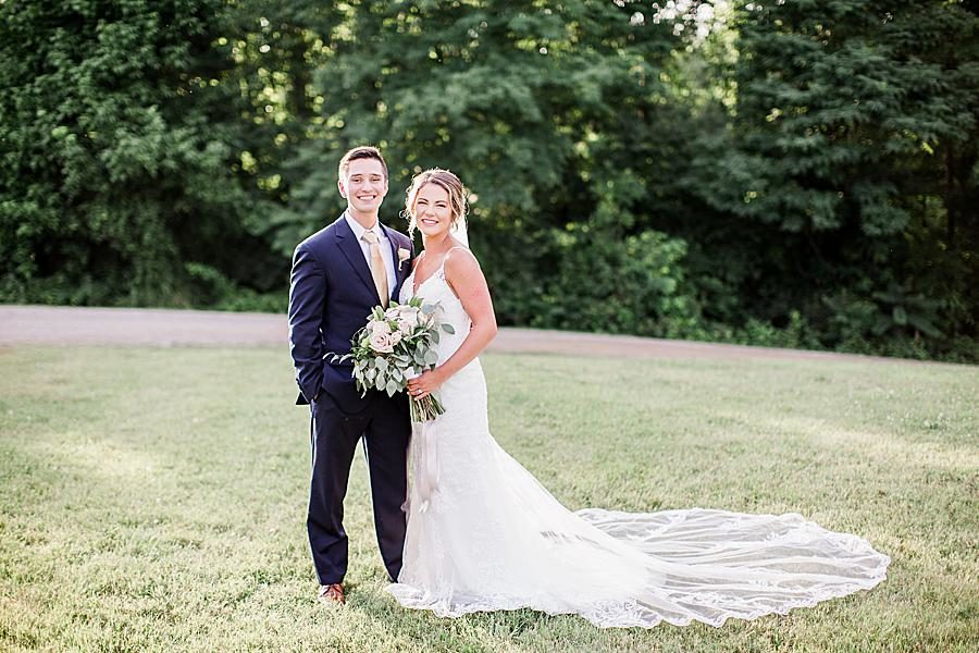 Bride and groom at this The Stables at Strawberry Creek wedding by Knoxville Wedding Photographer, Amanda May Photos.