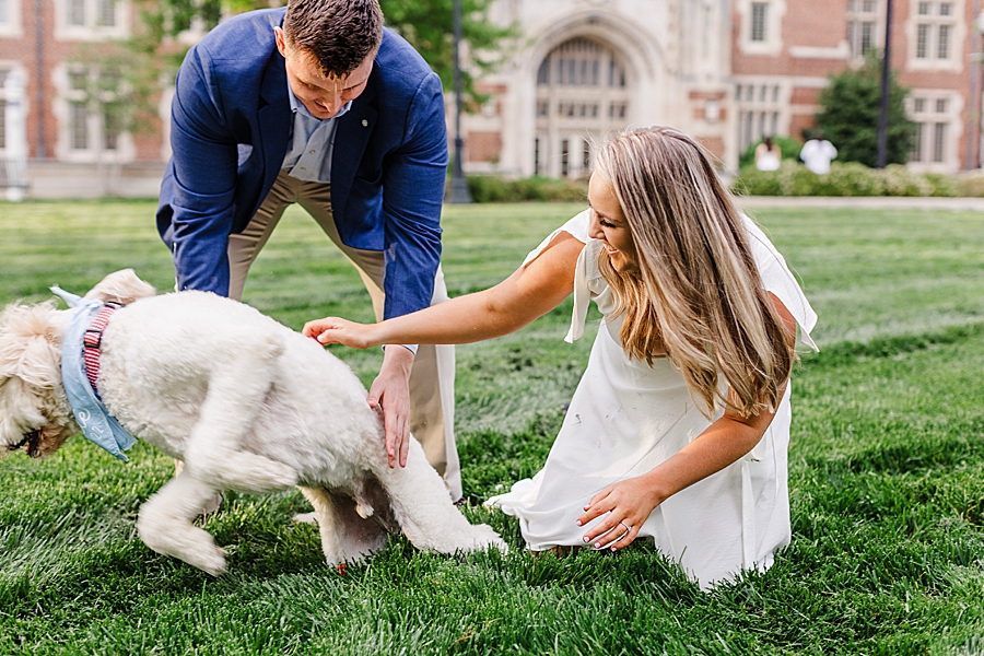 petting dog at ut campus engagement