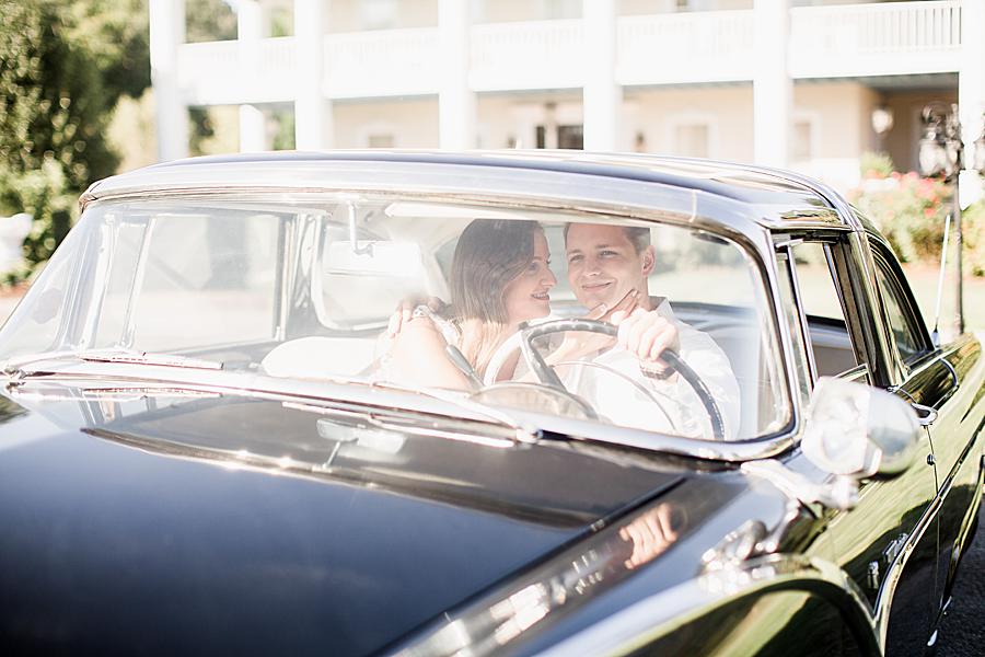 Couple at vintage car engagement 