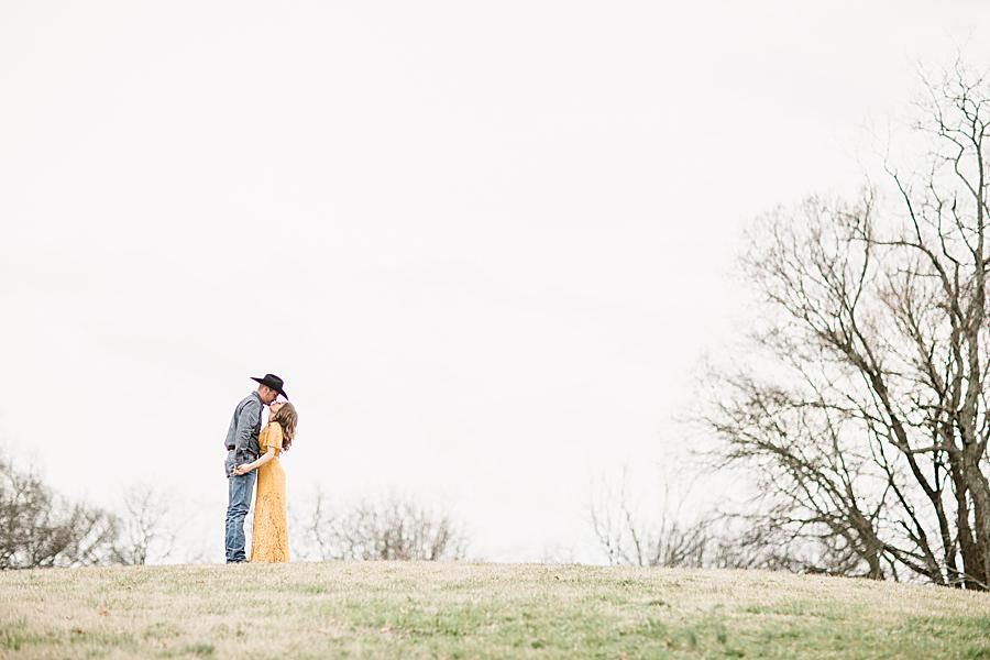 Yellow dress at this engagement session by Knoxville Wedding Photographer, Amanda May Photos.
