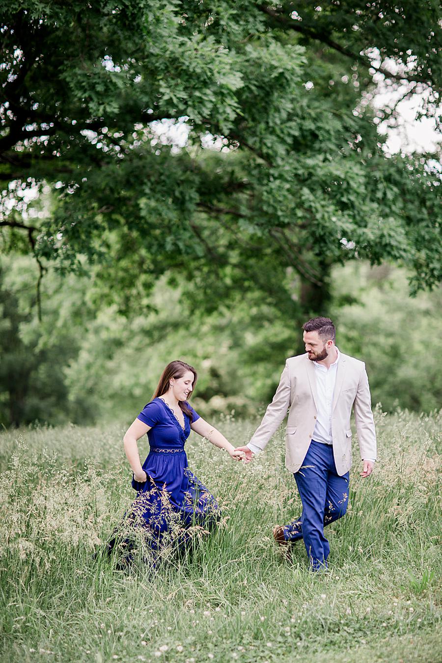 Holding hands by Knoxville Wedding Photographer, Amanda May Photos.