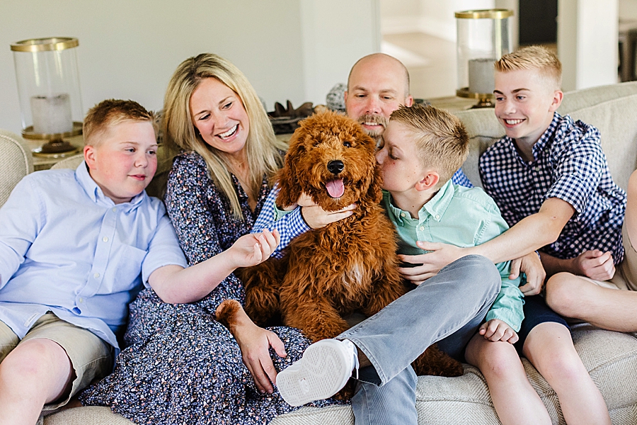 family loving on dog at west knoxville lifestyle session