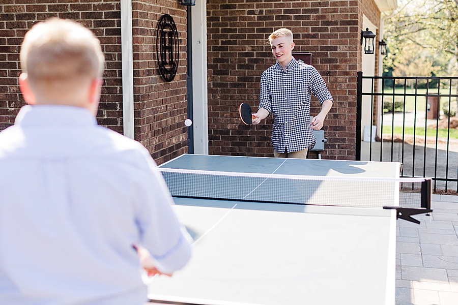 brothers playing ping pong